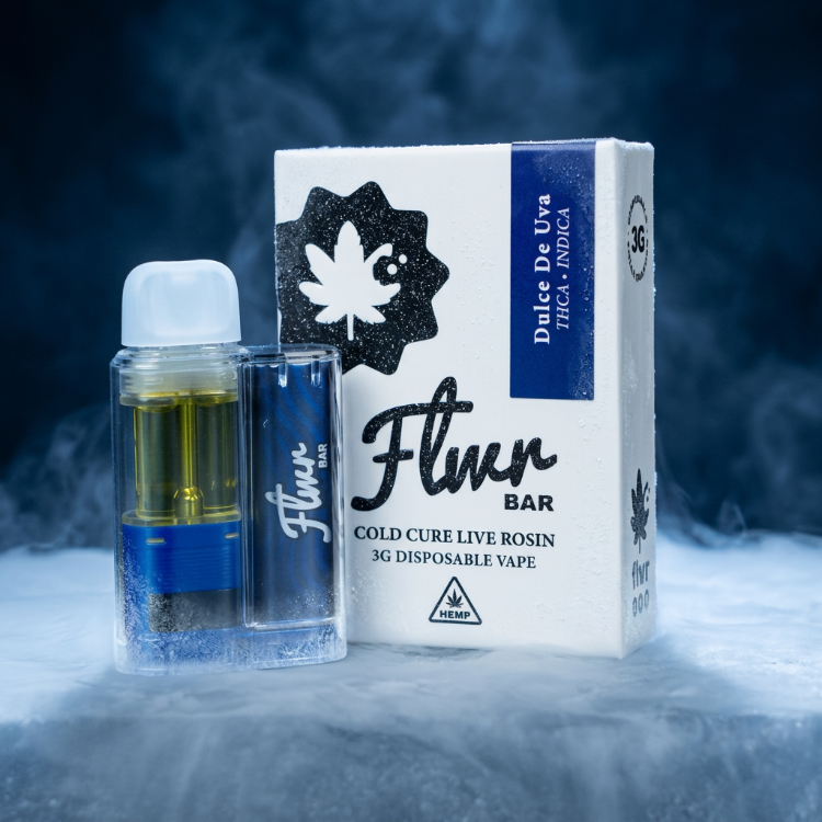 Flwr Bar 3G disposable vape and its packaging box, featuring a clear outer shell with blue and yellow liquid inside, set against a smoky dark blue background.