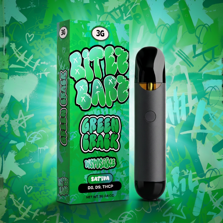 A disposable vape device in matte black with a gold mouthpiece stands next to its green packaging box labeled 'Little Race Green Grass' and 'Sativa' on a green graffiti-style background.